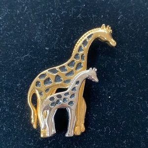 Vintage gold and silver tone pair of giraffes brooch/pin